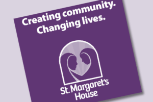 New St. Margaret's House logo with the text "Creating community. Changing lives."